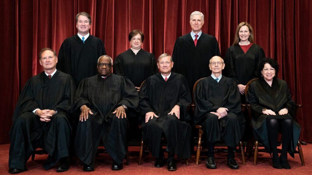 A group of people in black robes and gowns.